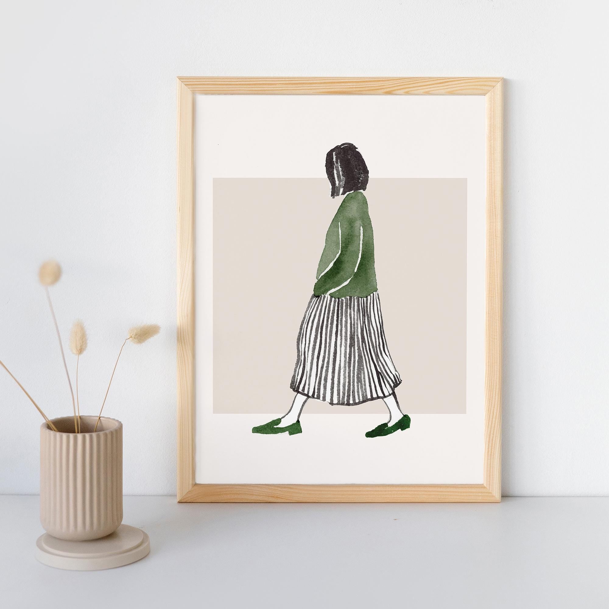 Minimalist Walking Woman Poster - Museum-Quality Matte Paper with Durable Wooden Frame, Available in Black, White, and Wood - 15 Sizes